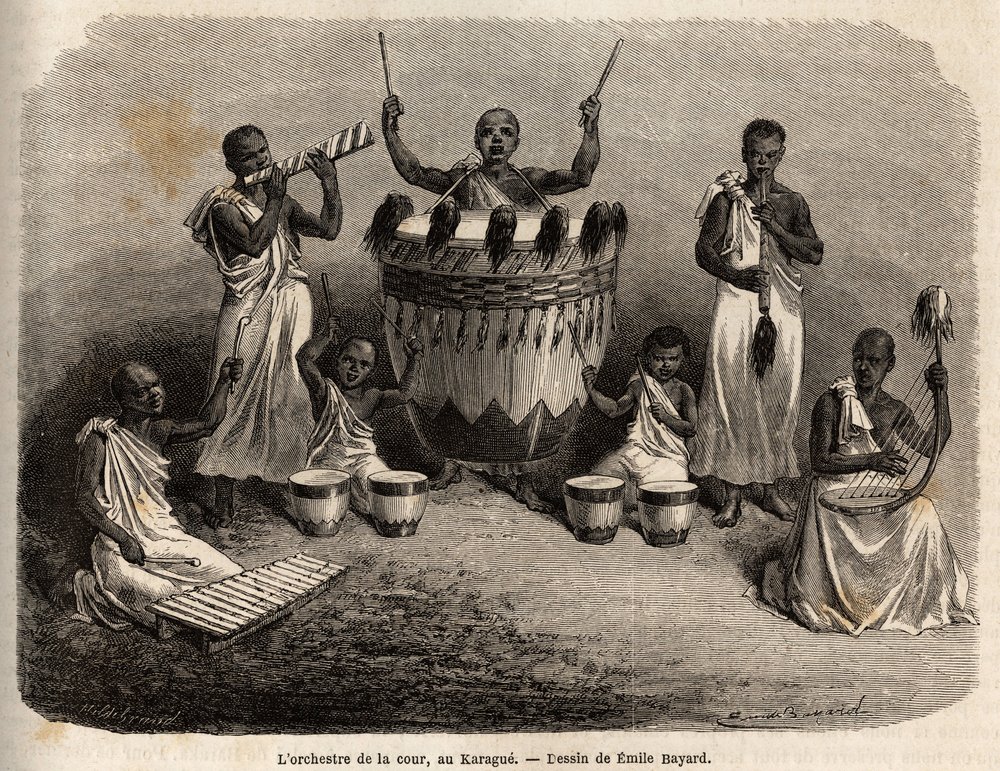 Das Hoforchester, in Karague (westlich des Viktoriasees, heutiges Simbabwe), Zeichnung von Emile Bayard (1837-1891), zur Illustration von Captain Spekes Entdeckungsreise in Afrika von 1860 bis 1863. Gravur in „Le tour du monde“, herausgegeben von Edouard C von Emile Antoine Bayard