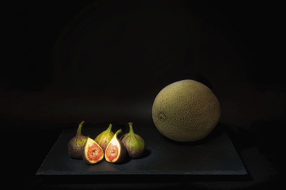 Stimmungsvolle Melone und Feigen von Saskia Dingemans
