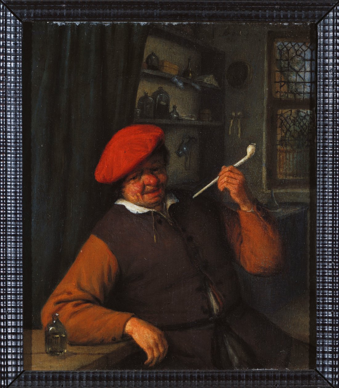 Ein Bauer mit rotem Barett, der eine Pfeife raucht, im Inneren von Adriaen Jansz. van Ostade