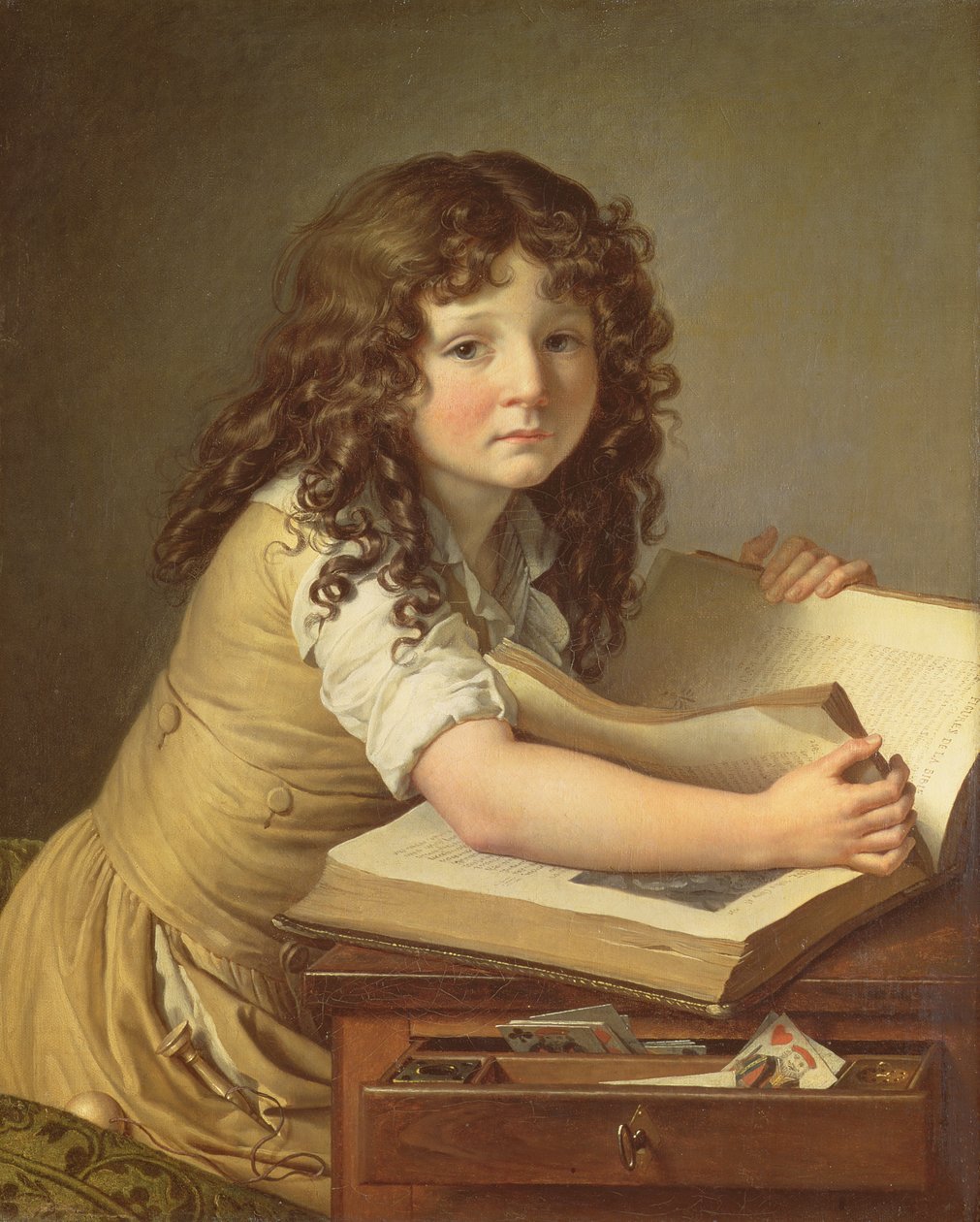 Ein Kind betrachtet Bilder in einem Buch von Anne-Louis Girodet de Roucy-Trioson