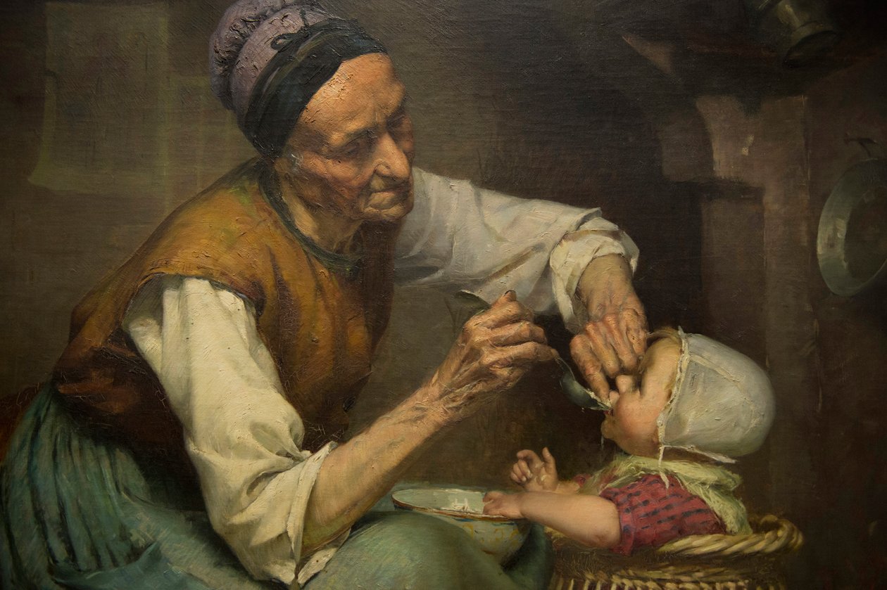 Eine alte Frau füttert ihre Enkelin in einem Weidenkinderwagen von Edouard Jerome Paupion