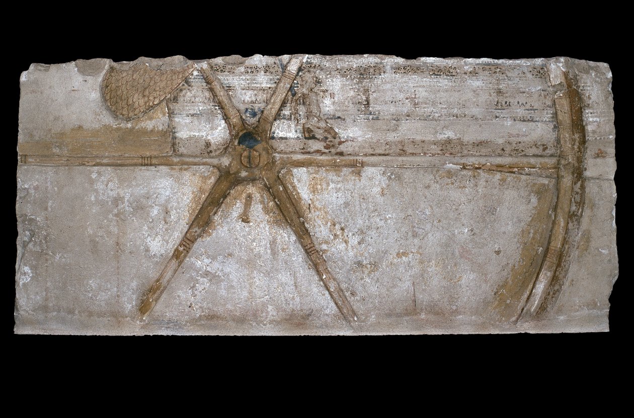 Geschnitzter und bemalter Kalksteinblock mit Darstellung eines Streitwagenrads, 1353-35 v. Chr. von Egyptian 18th Dynasty