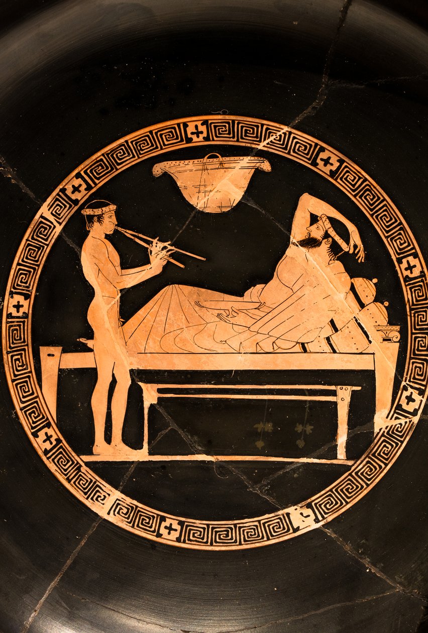 Becher: Symposiast und junger Sklave spielen die Doppelaulos von Euaion painter