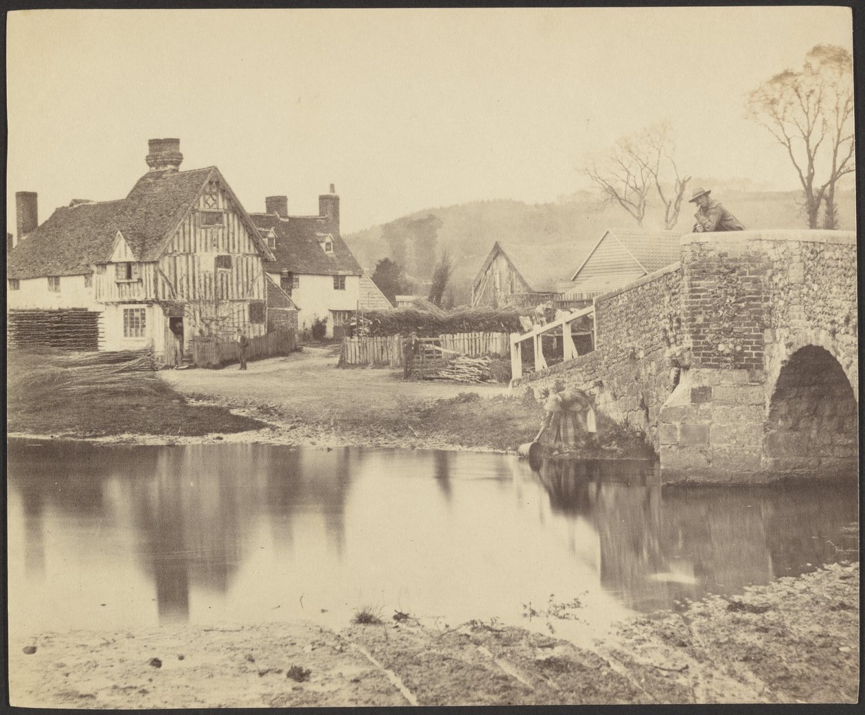 Ansicht eines Hauses über einen Fluss mit einer Brücke rechts von Francis Bedford