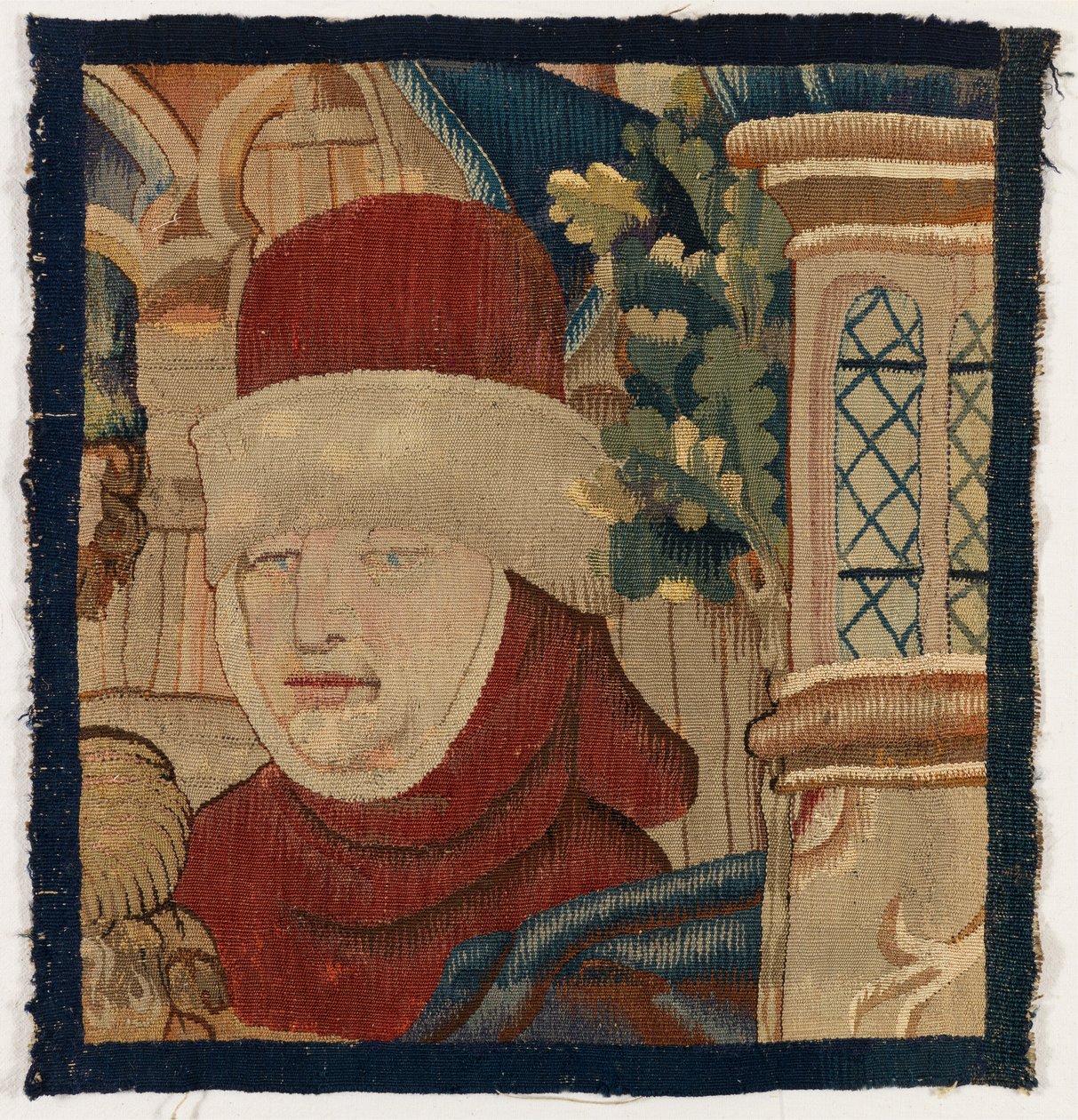 Kleines Fragment eines Wandteppichs, das den Kopf eines Mannes darstellt, spätes 15. Jahrhundert von Franco Flemish School