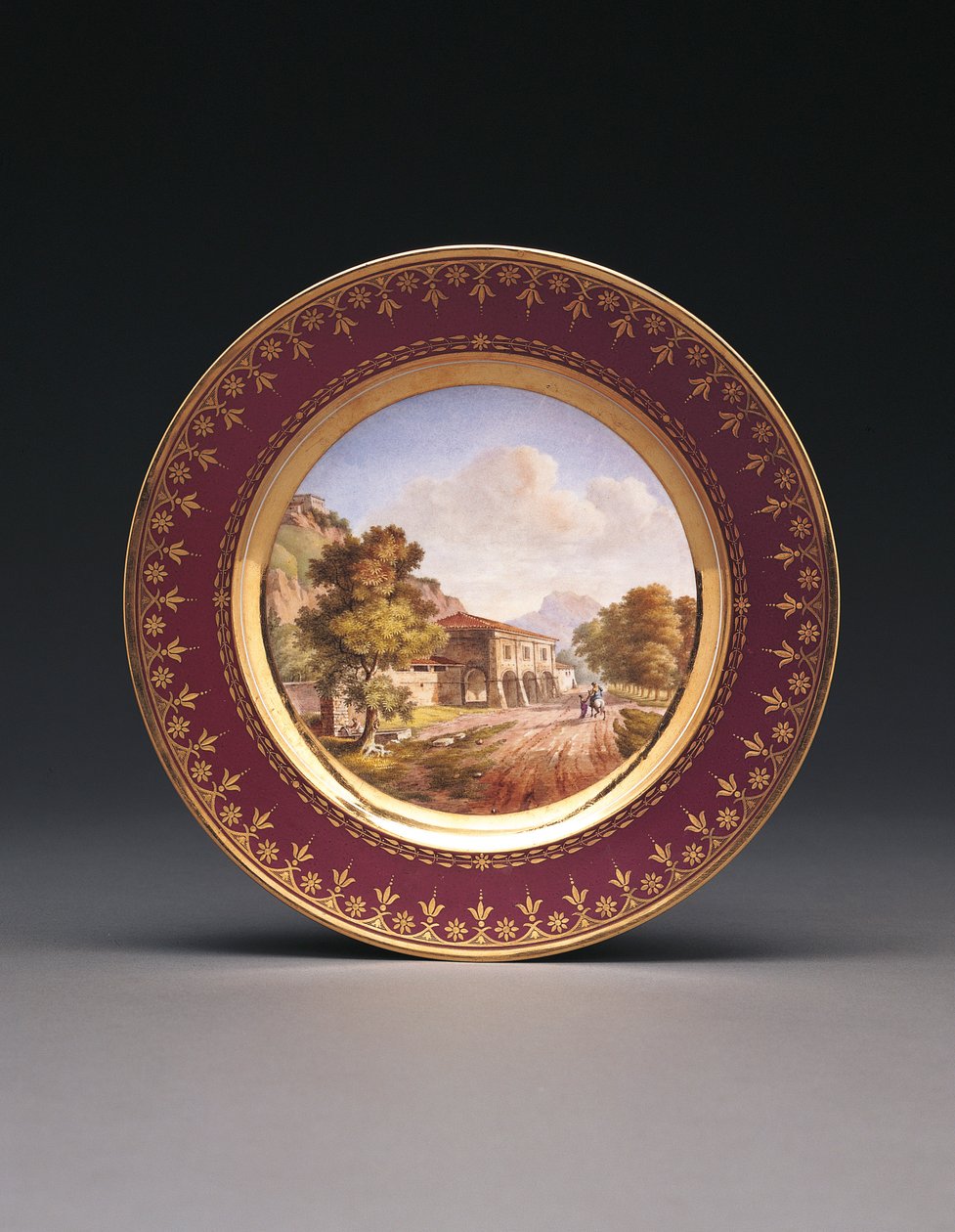 Sevres fond pourpre topographischer Teller von French School
