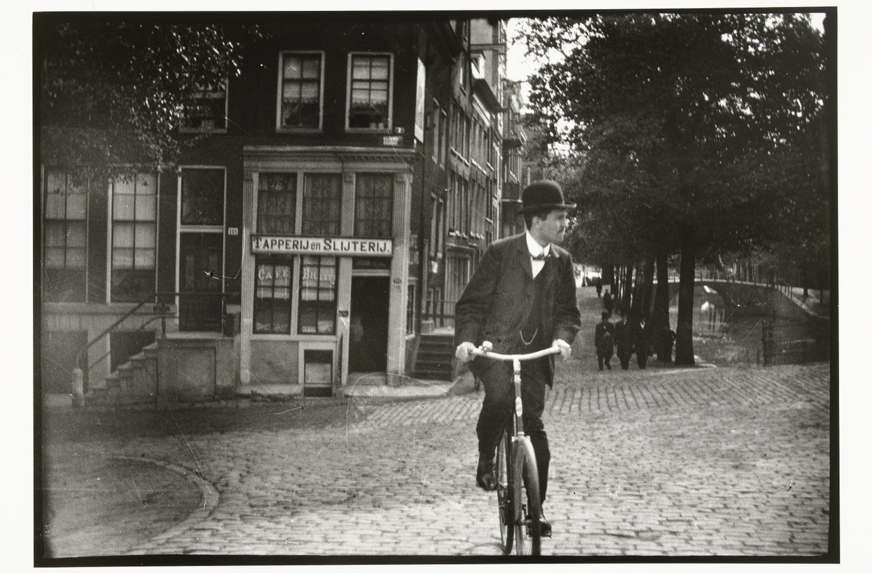 Radfahrer auf der Keizersgracht in Amsterdam von George Hendrik Breitner