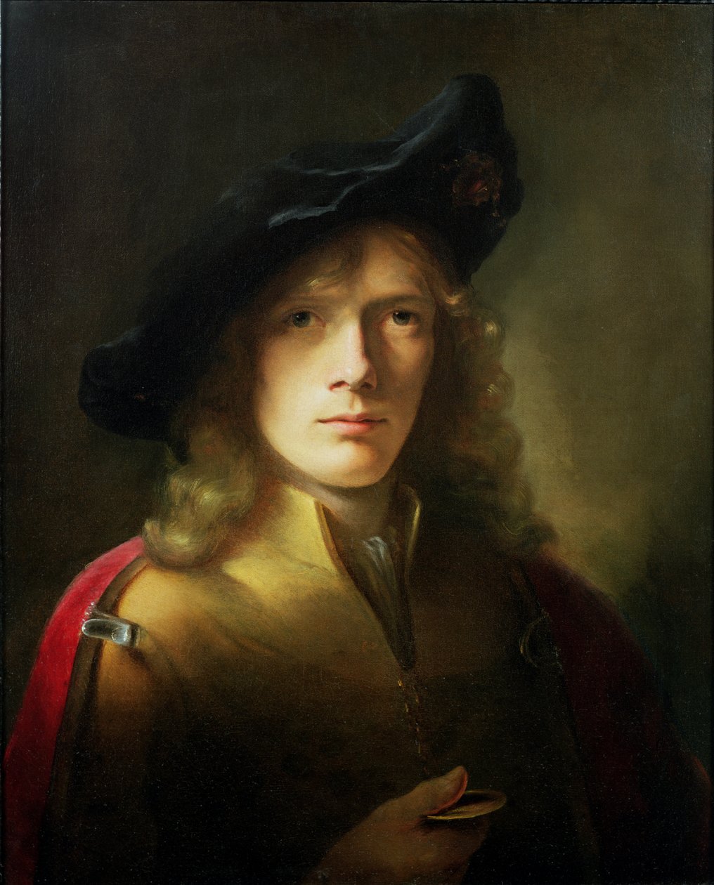 Porträt eines jungen Mannes, der eine Medaille hält von Godfrey Kneller
