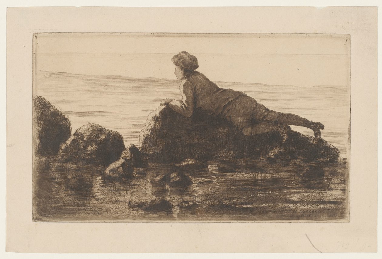 Junge, der auf Felsen am Strand liegt von Henri Charles Guérard