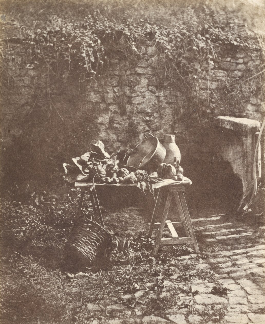 Stillleben: Kessel, Krug und Gemüse auf einem Tisch mit Böcken von Henri Victor Regnault