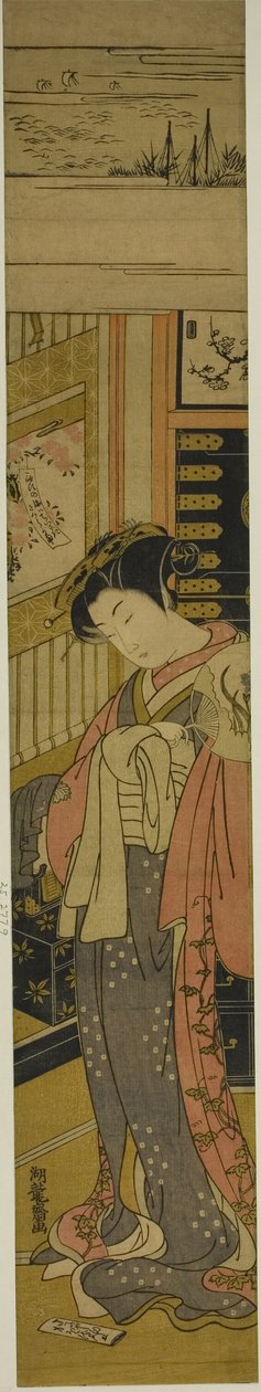 Die Kurtisane Kaoru von Chojiya schaut auf einen Liebesbrief auf dem Boden von Isoda Koryusai