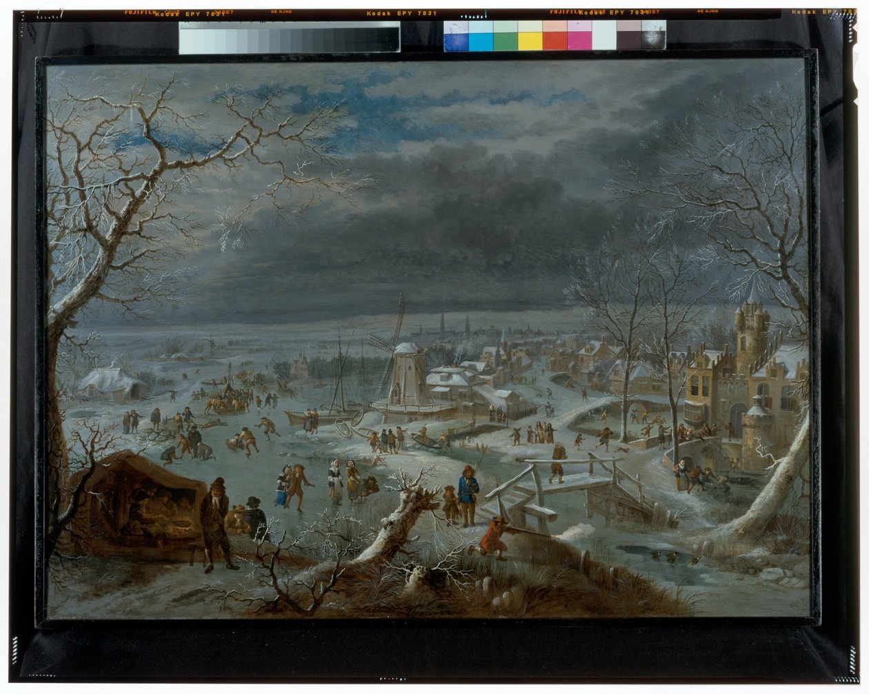 Winterlandschaft mit Schlittschuhläufern auf einem gefrorenen Teich bei einem Dorf von Jan Griffier