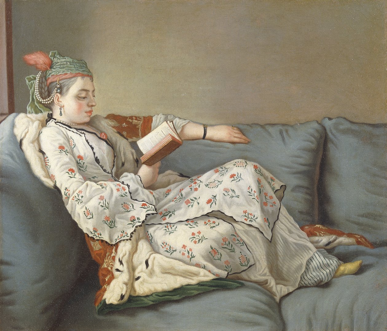 La Sultane Lisant, Eine Dame in türkischer Tracht, die auf einem Diwan liest von Jean Étienne Liotard