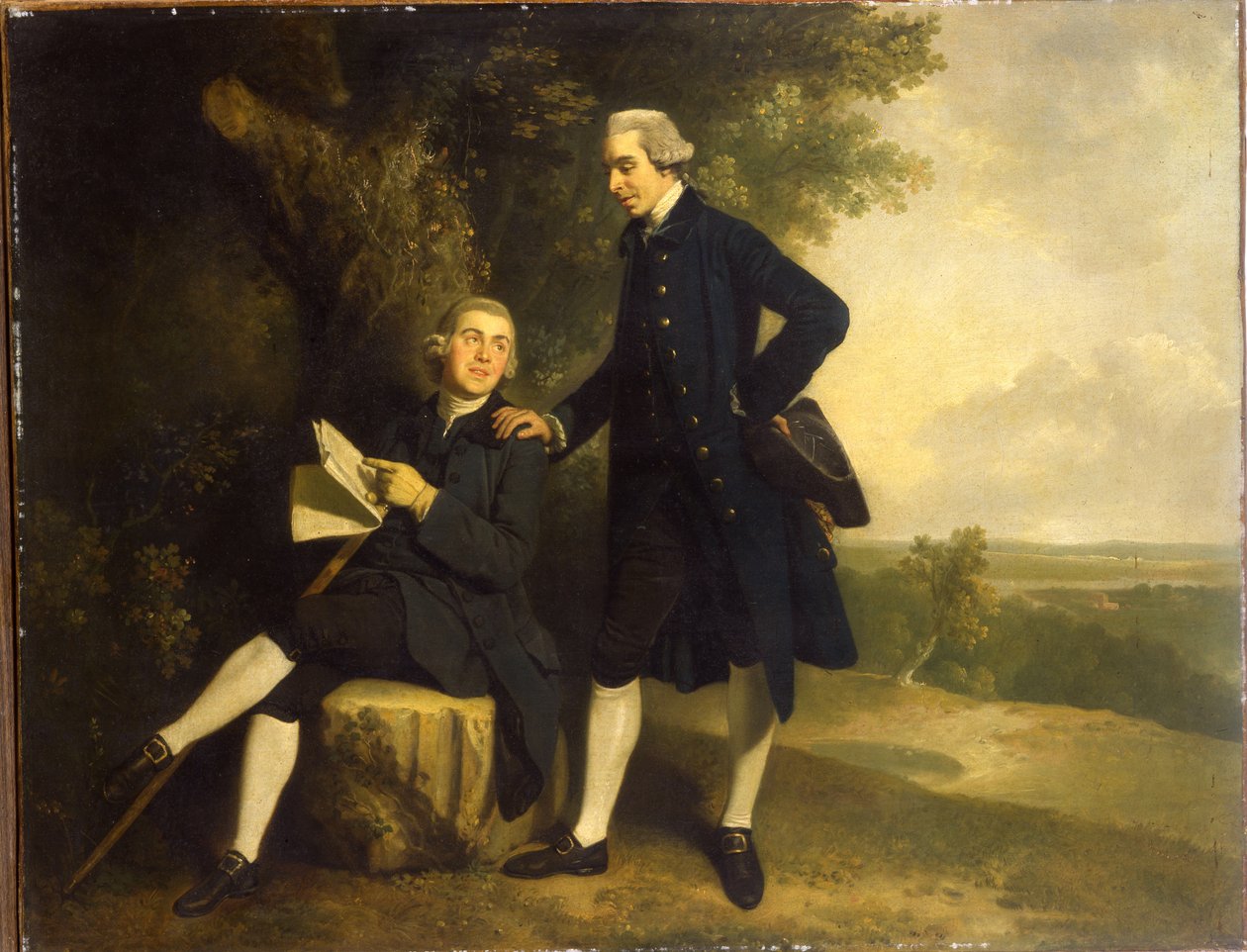 Doppelporträt von Thomas Somers Cocks und Richard Cocks von Castleditch, beide in voller Länge, der erste in einem blauen Mantel und Weste, der einen schwarzen Dreispitz hält, der zweite sitzt in einem blauen Mantel und Weste und hält ein Manuskript, in ei von John Hamilton Mortimer