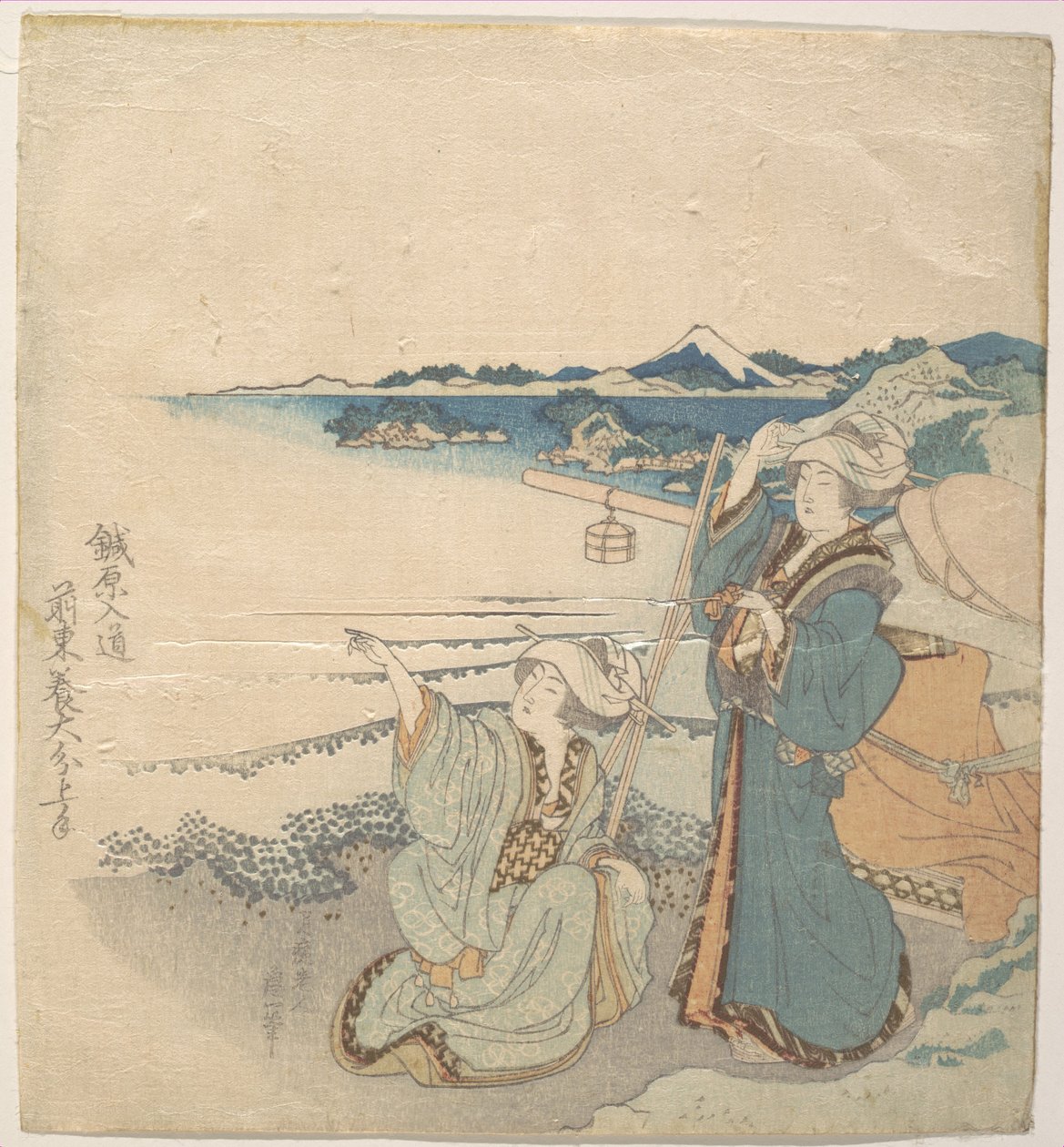 Zwei junge Damen am Ufer; eine zeigt von Katsushika Hokusai