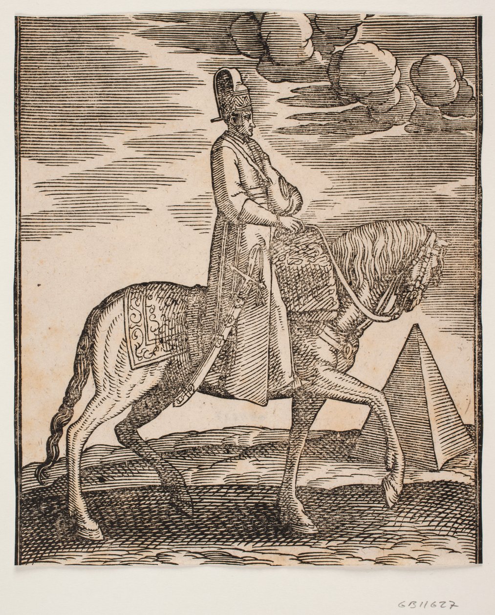Reiter mit einer Flasche um den Hals, Profil nach rechts; ein Schwert an seiner rechten Seite und Gepäck vor ihm, über den Sattel drapiert; rechts im Hintergrund eine Pyramide von Melchior Lorck