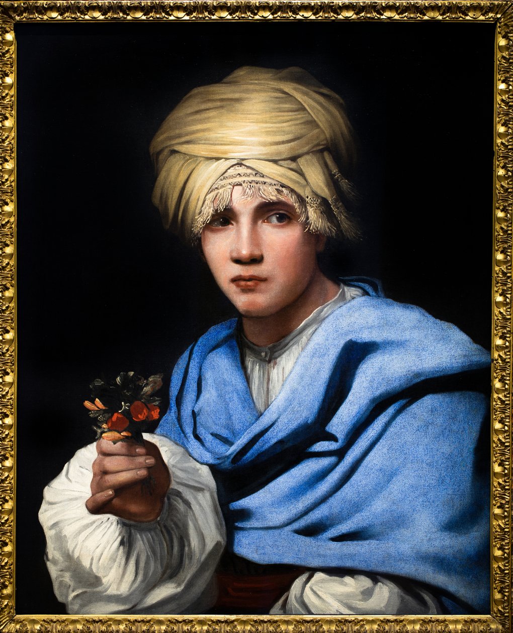 Junge mit Turban, der einen Blumenstrauß hält von Michael Sweerts