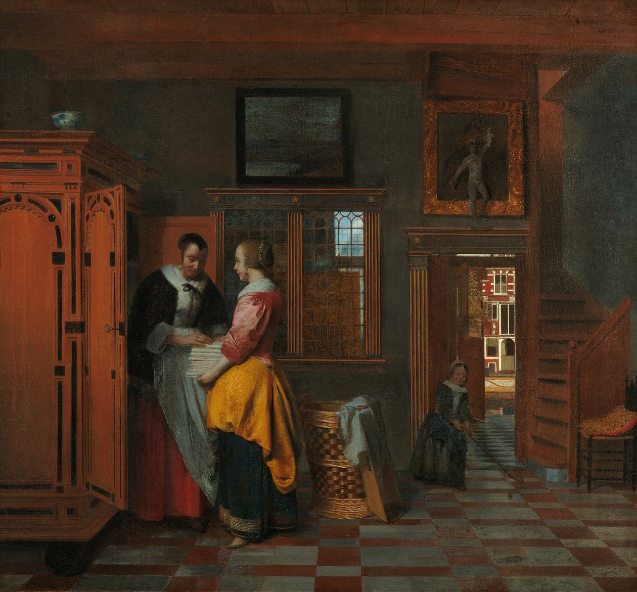 Innenraum mit Frauen neben einem Wäscheschrank von Pieter de Hooch