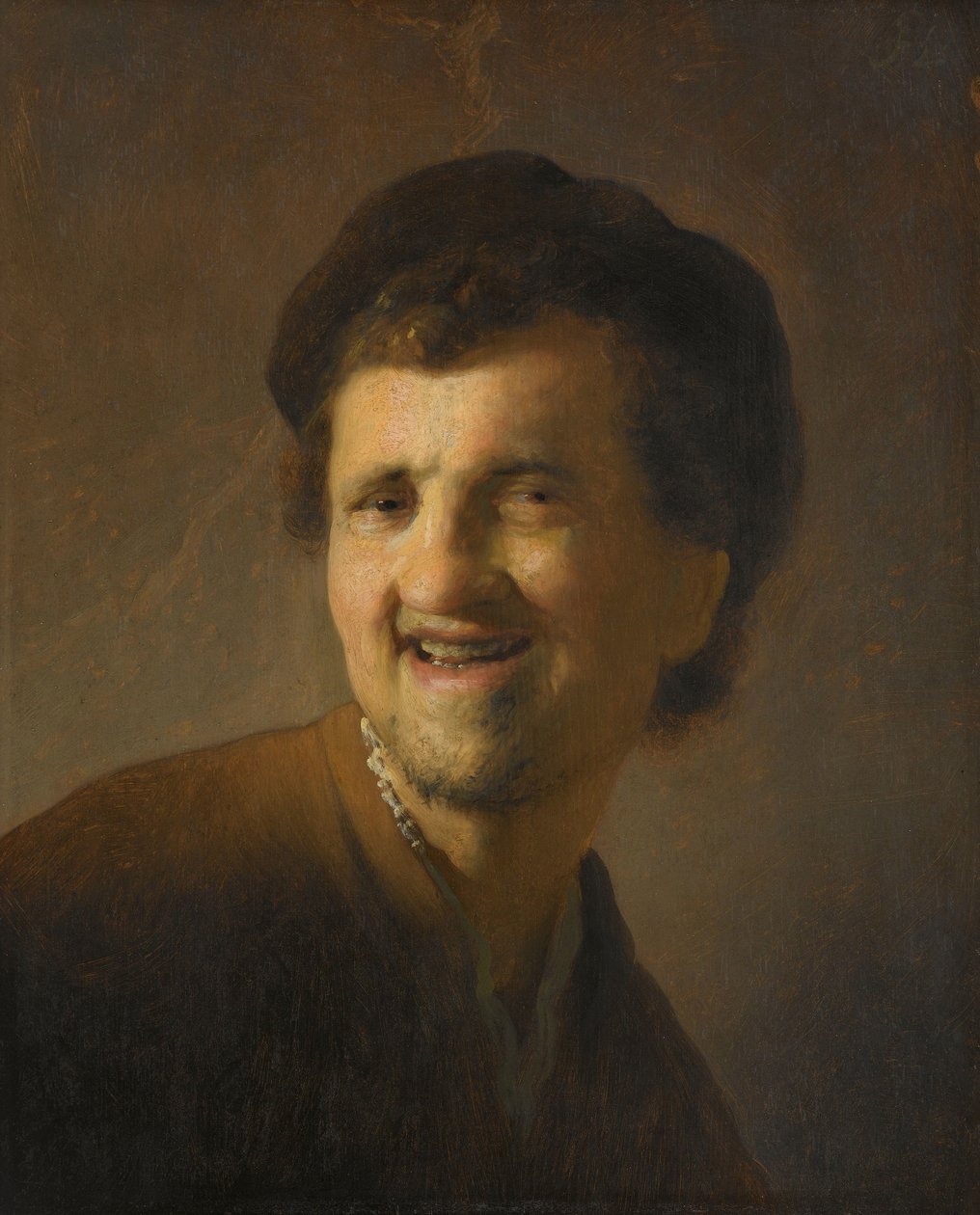 Lachender junger Mann (Büste) von Rembrandt van Rijn (circle of)