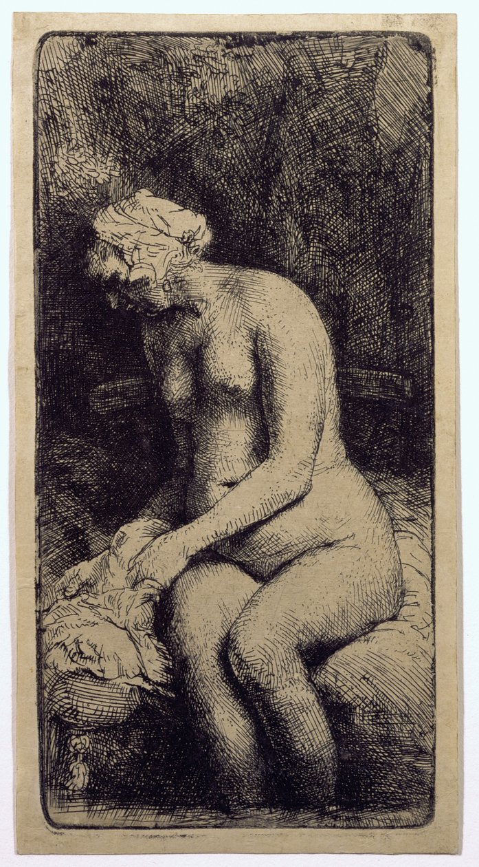 Eine Frau badet ihre Füße an einem Bach von Rembrandt van Rijn