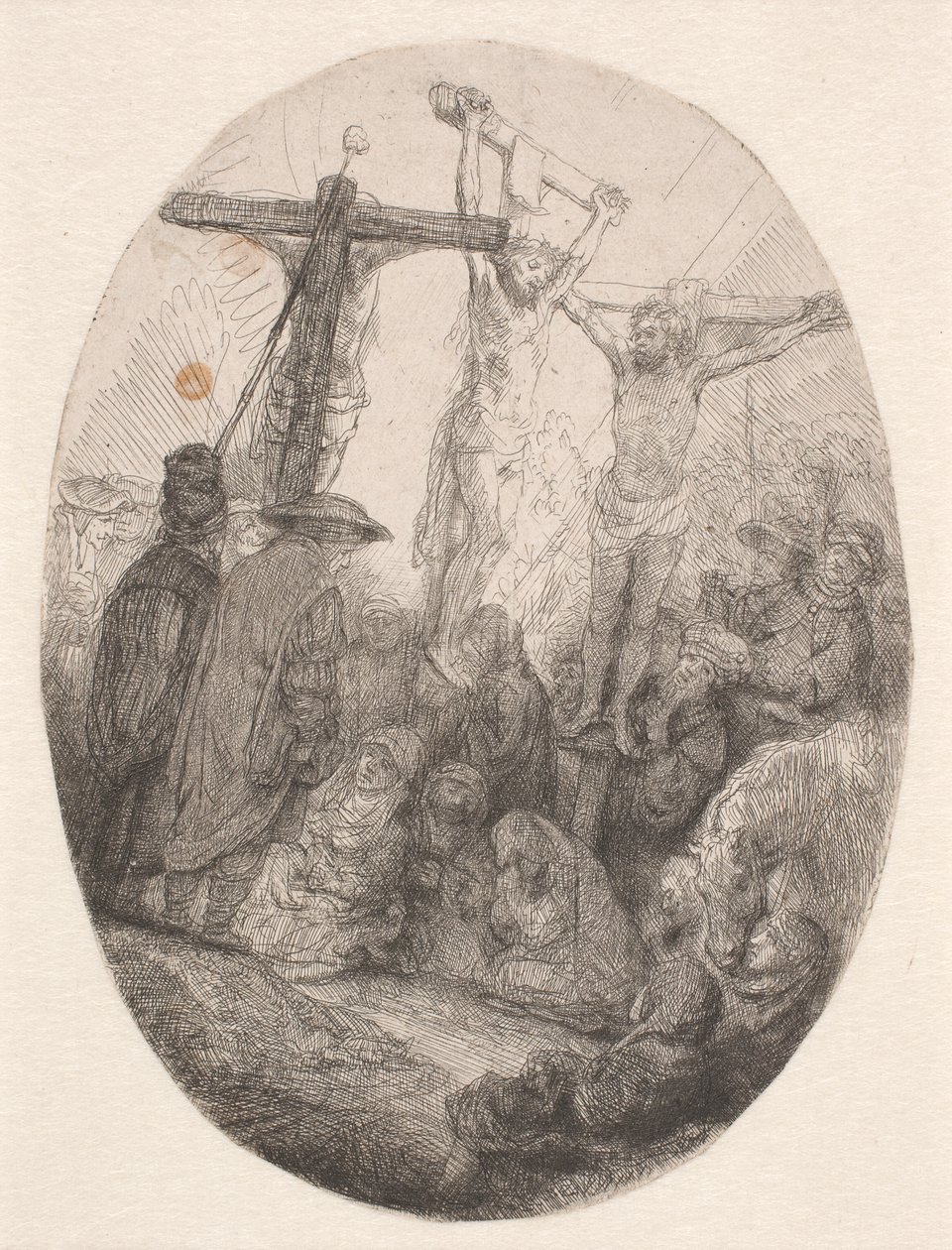 Christus gekreuzigt zwischen den beiden Dieben: eine ovale Platte von Rembrandt van Rijn
