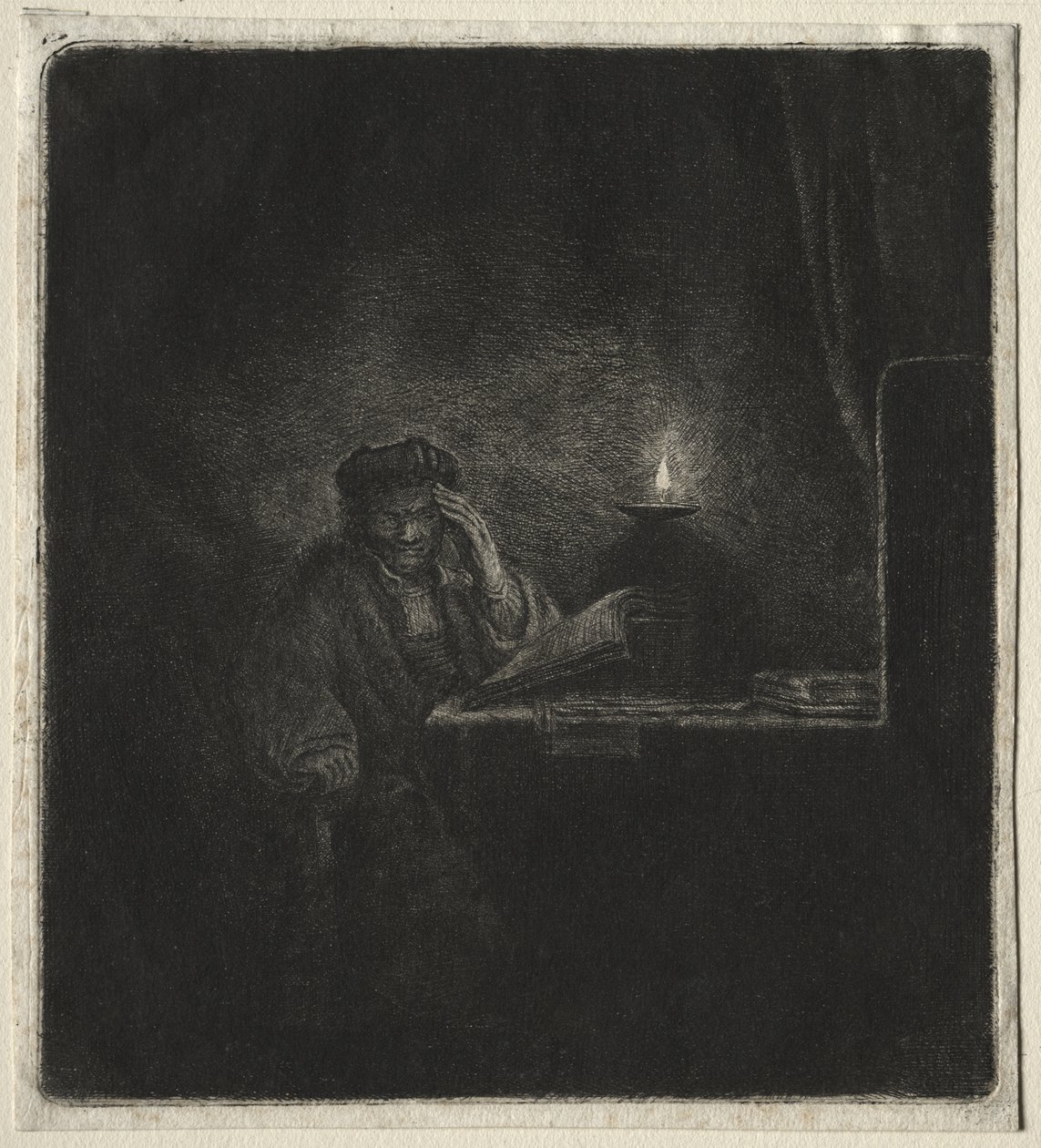 Kopie von Student an einem Tisch bei Kerzenlicht von Rembrandt van Rijn