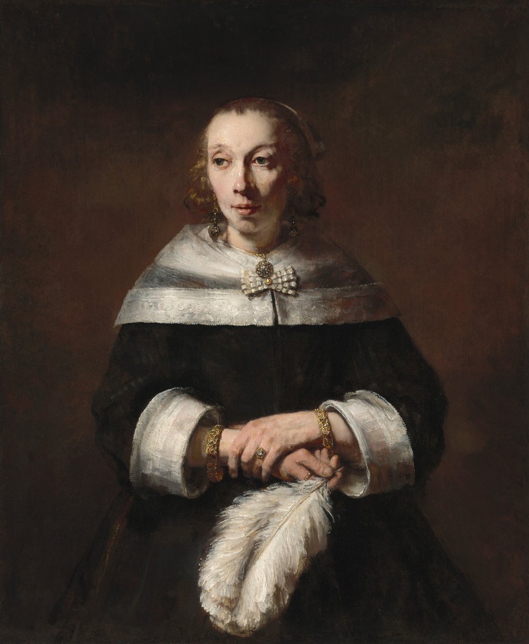 Porträt einer Dame mit einem Straußenfederfächer von Rembrandt van Rijn