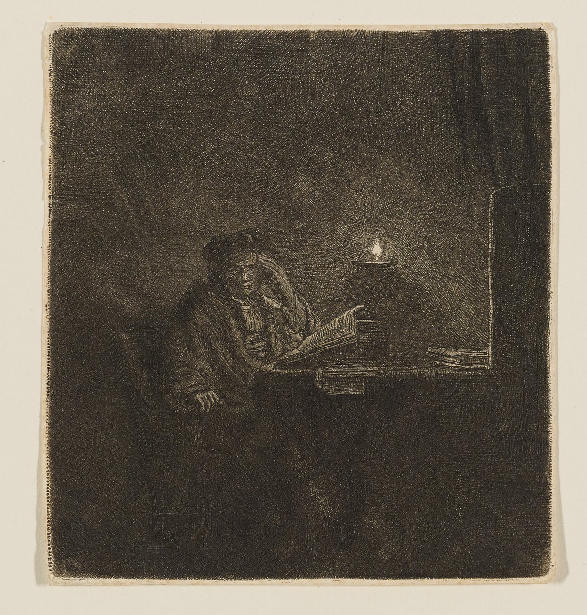 Student an einem Tisch bei Kerzenlicht von Rembrandt van Rijn