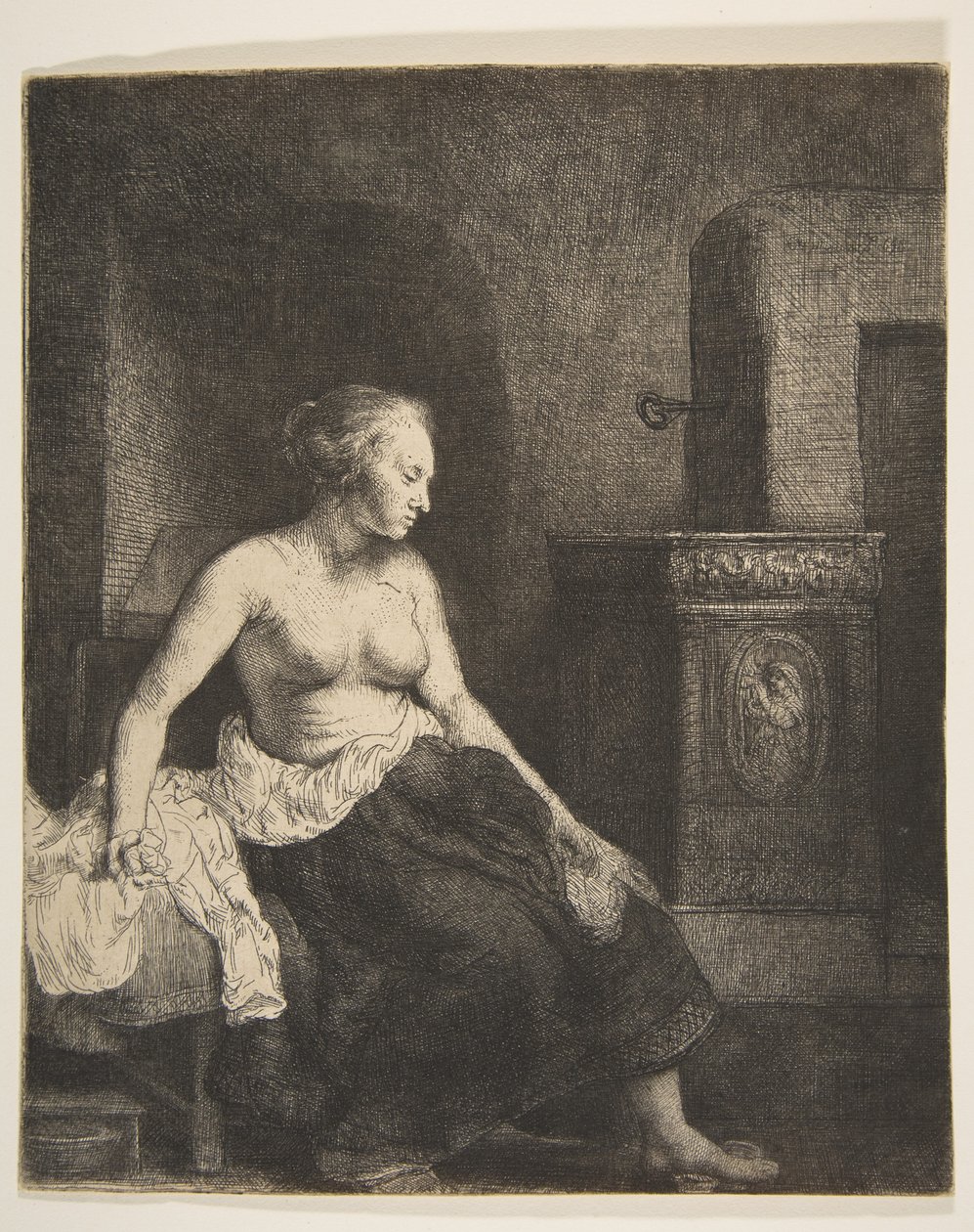 Halb angezogene Frau sitzt neben einem Ofen, 1658 von Rembrandt van Rijn
