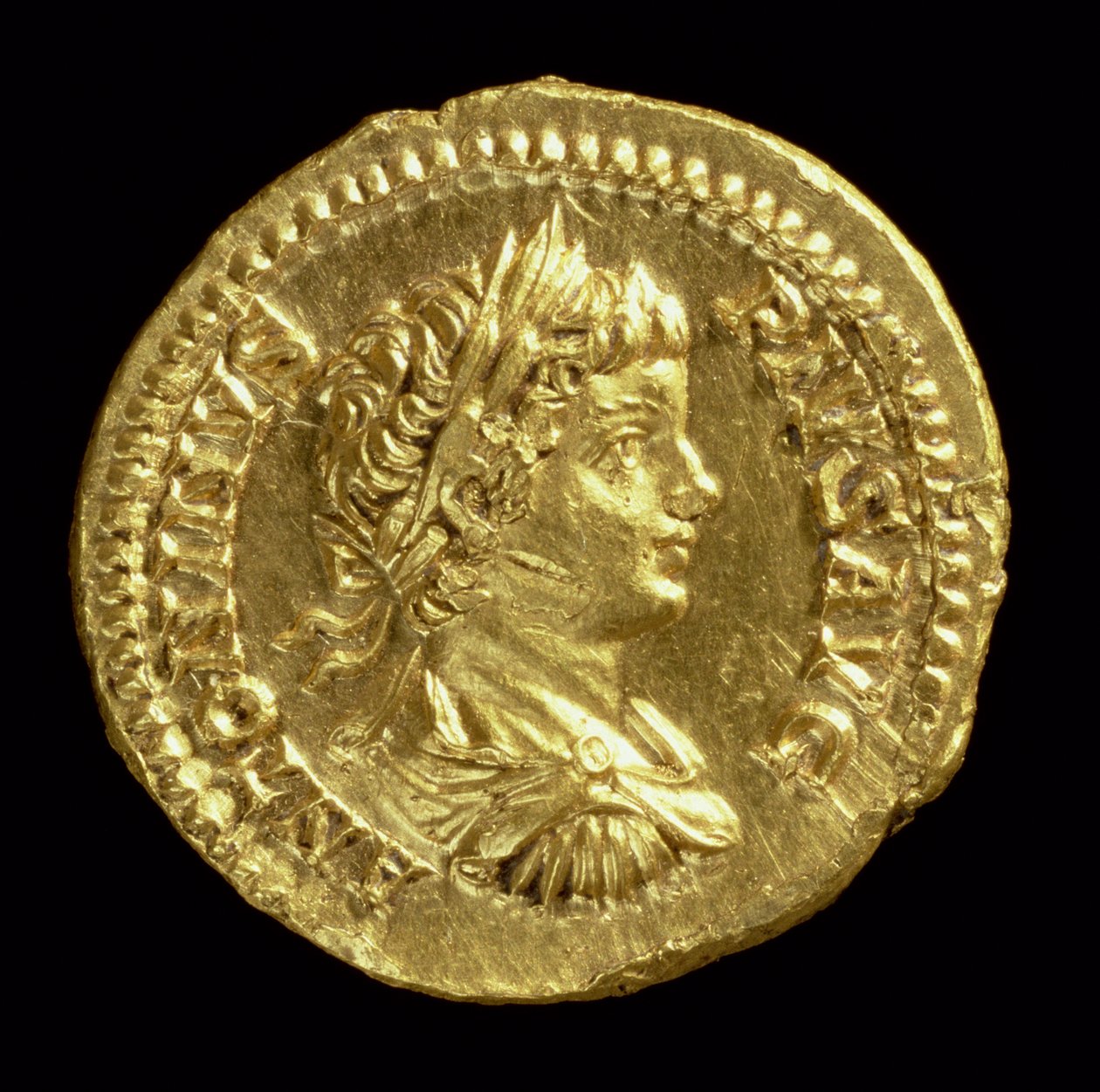 Aureus (Vorderseite) mit dem Kopf von Caracalla (196-217 n. Chr.), drapiert, gepanzert, mit Lorbeerkranz. Inschrift: ANTONINVS PIVS AVG von Roman