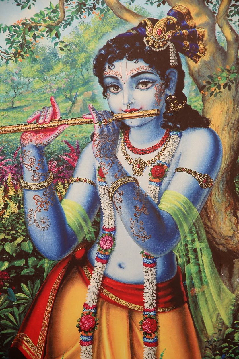 Gemälde, das den hinduistischen Gott Krishna zeigt, wie er im Freien Flöte spielt. Indien von Unbekannt