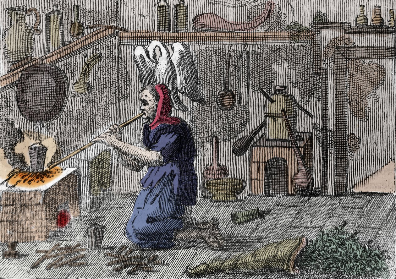 Eine Hexe in ihrem Labor, die einen Zaubertrank zubereitet, rechts ein Horn gefüllt mit magischen Kräutern. Gravur aus dem 16. Jahrhundert von Unknown artist