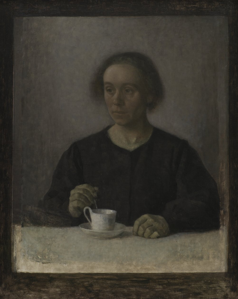 Ida Hammershøi, die Frau des Künstlers, mit einer Teetasse von Vilhelm Hammershøi
