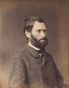 [Bärtiger Mann in Tweedjacke]