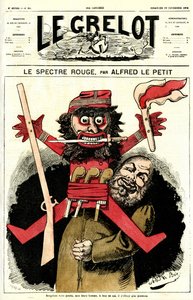 Ein katholischer Priester schwenkte eine kleine Figur von Alfred Le Petit