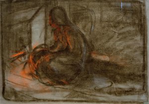 Vor dem Feuer sitzende Frau