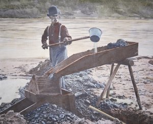 Amerikanischer Goldsucher mit einer Rinne
