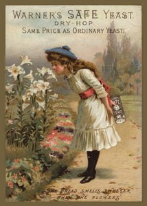 Mädchen riecht an Lilien und hält Hefe von American School