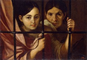 Zwei Frauen hinter einem Gitter