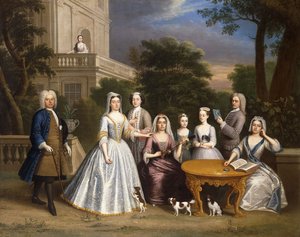 Gruppenporträt einer Familie, im Garten eines Landhauses