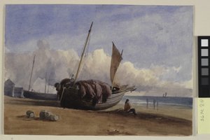 Gestrandetes Fischerboot mit sitzendem Fischer