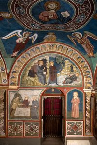 Verschiedene Episoden aus dem Leben des Heiligen Benedikt: im Zentrum „Das Wunder des Heiligen Placidus“. Benedikt von Nursia rettet dank des Eingreifens seines ersten Jüngers Maurus den jungen Placidus, der in den Strom eines Sees geraten ist. Unten das W