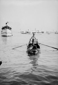 Ein Sampan in Penang rudern