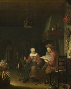 Innenraum mit einem Mann, der liest, und einer Frau, die Garn spinnt