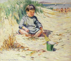 Im Sand spielen