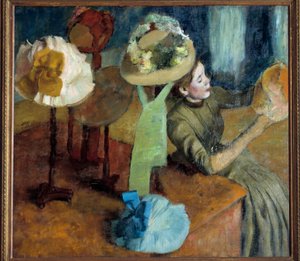 Beim Modisten (oder Der Modistenladen) von Edgar Degas