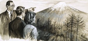 Unbekannter Mann zeigt auf den Berg Fuji in Japan