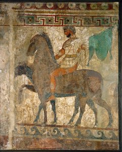 Ein Reiter in einer Prozession