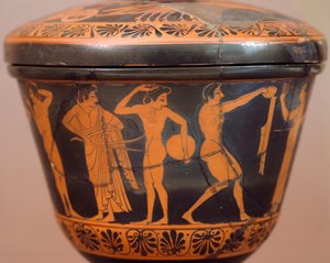 Pyxis mit Athleten, die Diskus und andere Disziplinen ausführen. Rotfigurige Keramik, aus Cerveteri (Latium). Etruskische Zivilisation, 4. Jahrhundert v. Chr.