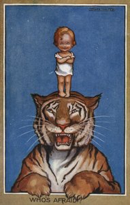 Baby steht auf dem Kopf eines Tigers